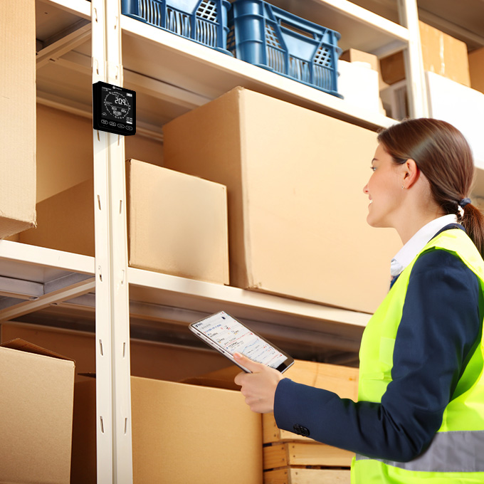 Fusion in Warehouse | Multi-site Storage | Lady Checking Boxes